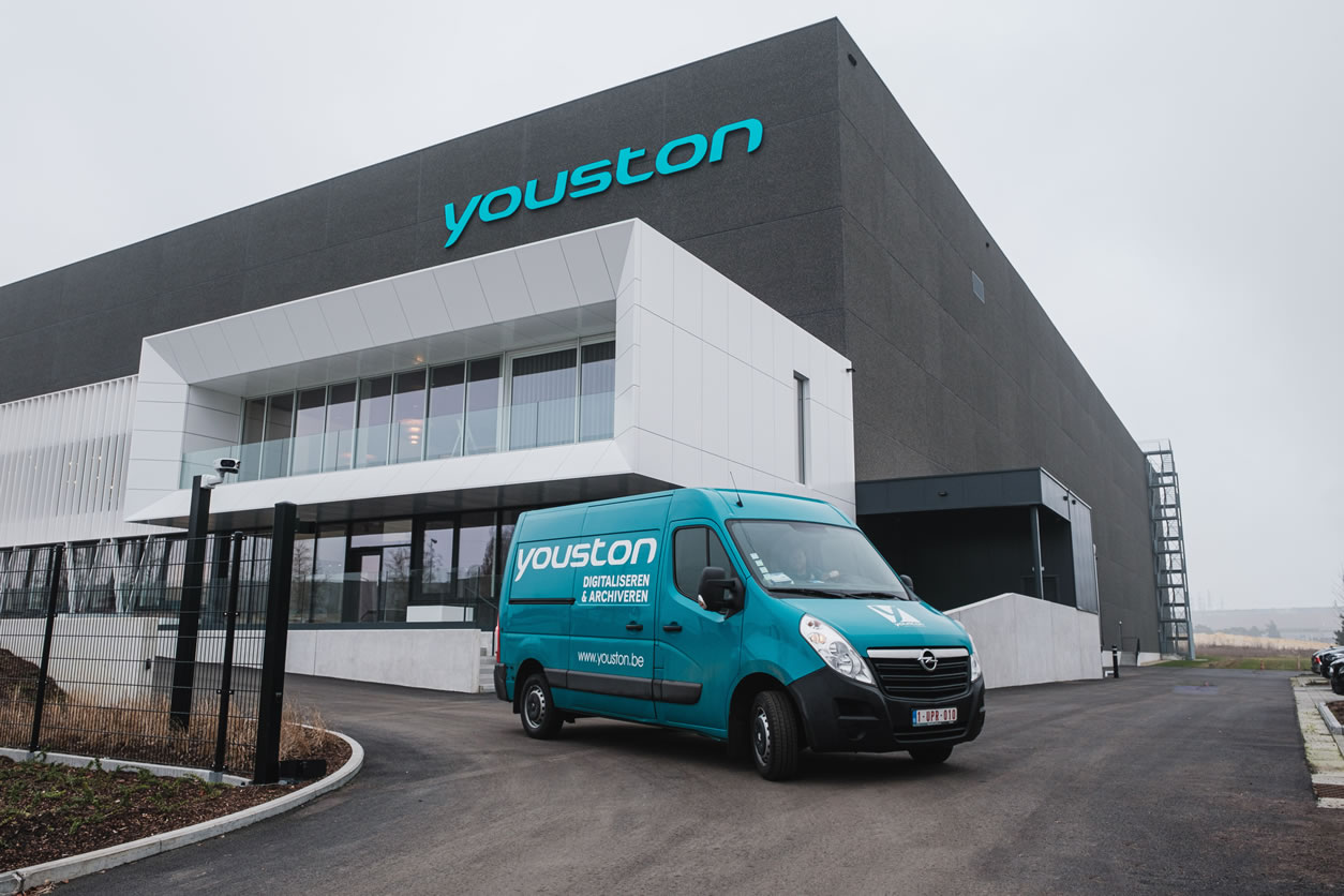 Youston HQ & archive storage building with Youston vehicle leaving to pick up customer archives & documents